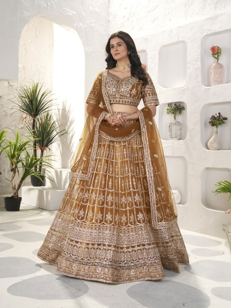 Elegnat Ethnic Festive Luxe Golden Net Lehanga Suit